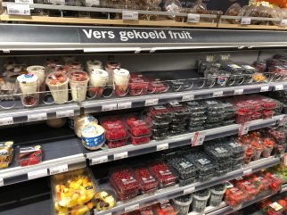 Strawberries are displayed in a refrigeration unit in the supermarket. Photo by WFBR