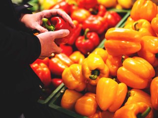 Sweet peppers in the supermarket. Photo by siamionau pavel/Shutterstock.com