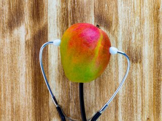 Early detection of diseases in a mango batch can reduce further incidence. Photo by iLUXimage/Shutterstock.com